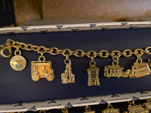 Load image into Gallery viewer, 50th Anniversary Park Transportation Icon Charm Bracelet
